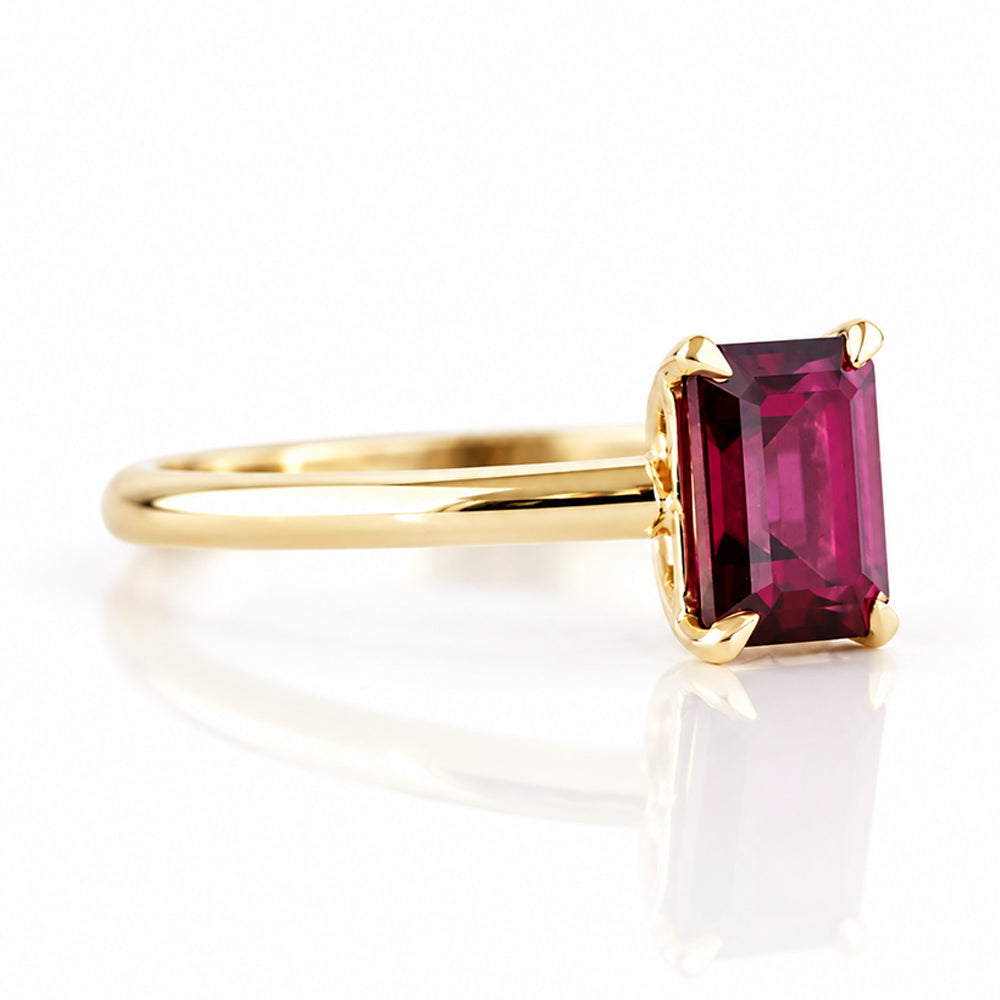 Mari, an Emerald cut Rhodolite Solitaire Ring