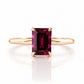Mari, an Emerald cut Rhodolite Solitaire Ring
