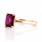 Mari, an Emerald cut Rhodolite Solitaire Ring