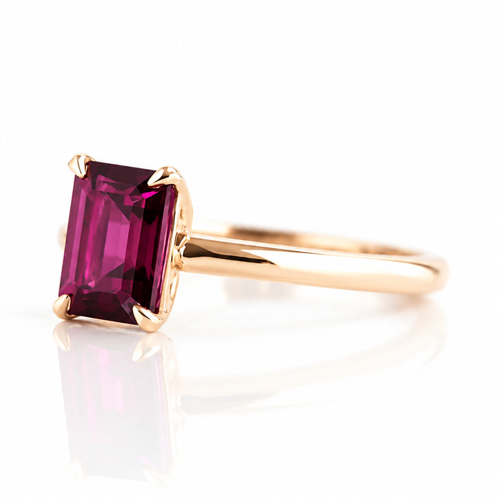 Mari, an Emerald cut Rhodolite Solitaire Ring