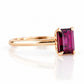 Mari, an Emerald cut Rhodolite Solitaire Ring