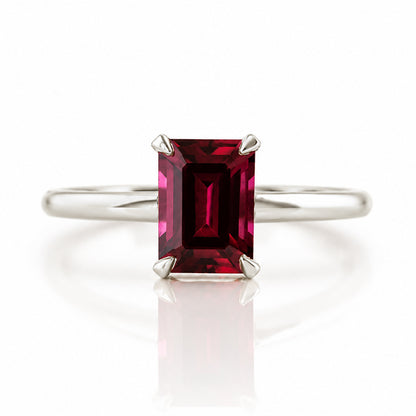 Mari, an Emerald cut Rhodolite Solitaire Ring