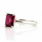 Mari, an Emerald cut Rhodolite Solitaire Ring
