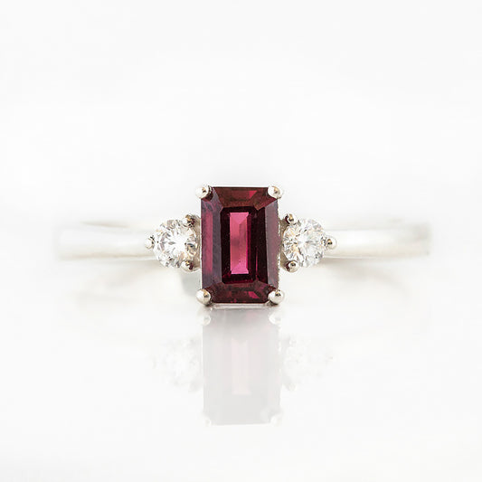 Emerald cut Rhodolite and Diamond trilogy engagement ring - Victoria's Jewellery