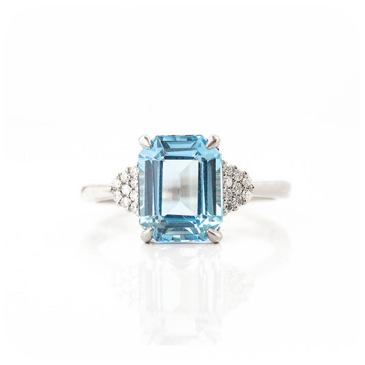 emerald cut blue topaz and moissanite engagement ring in a vintage style - Victoria's Jewellery