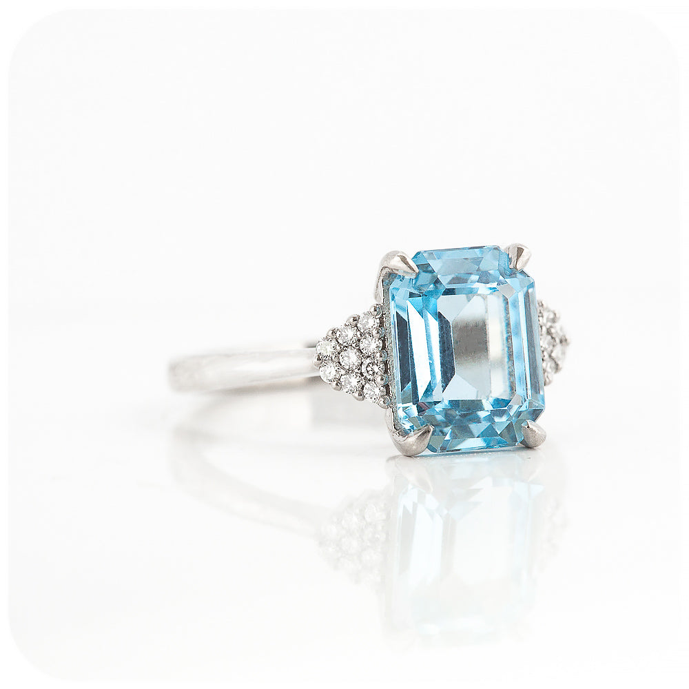 emerald cut blue topaz and moissanite engagement ring in a vintage style - Victoria's Jewellery