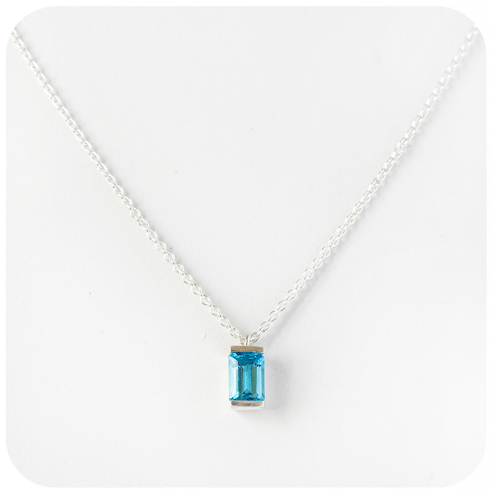 emerald cut swiss blue topaz november birthstone pendant and chain