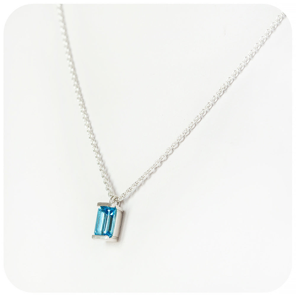 emerald cut swiss blue topaz november birthstone pendant and chain