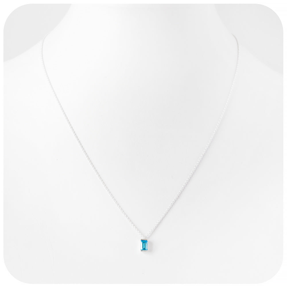 emerald cut swiss blue topaz november birthstone pendant and chain