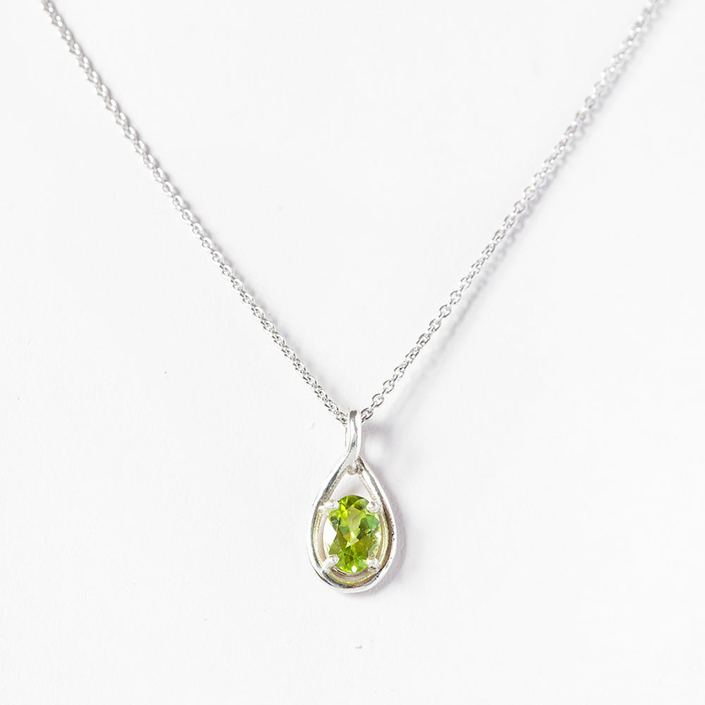 The Infinity Pendant with Peridot - 7x5mm