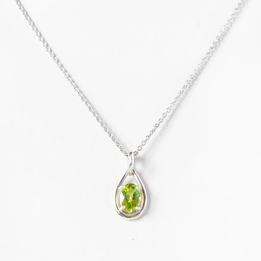 The Infinity Pendant with Peridot - 7x5mm