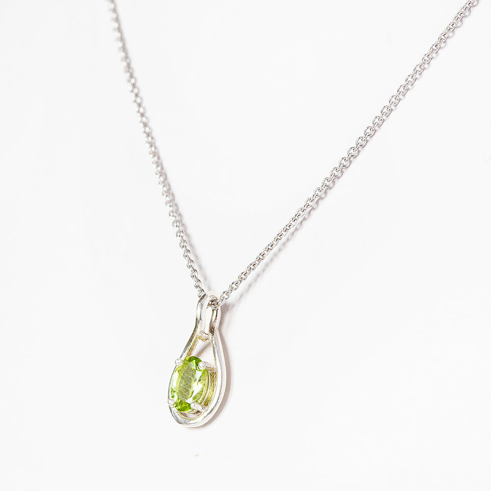 The Infinity Pendant with Peridot - 7x5mm