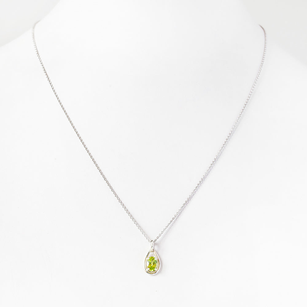 The Infinity Pendant with Peridot - 7x5mm