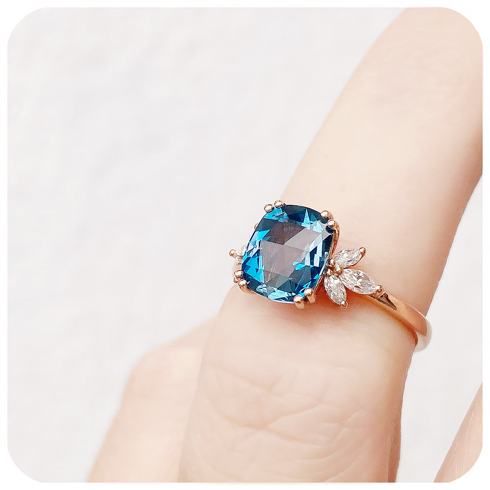 Cushion cut London Blue Topaz and Moissanite Flower Engagement Ring - Victoria's Jewellery