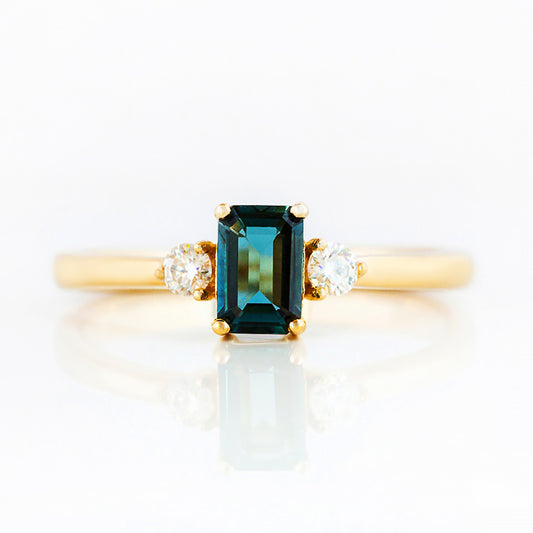 Emerald cut London Blue Topaz and Diamond Trilogy Engagement Ring in Yellow Gold - Victoria's Jewellery