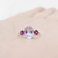 Oval cut Pink Amethyst and Rhodolite Trilogy Anniversary Ring - Victoria's Jewellery