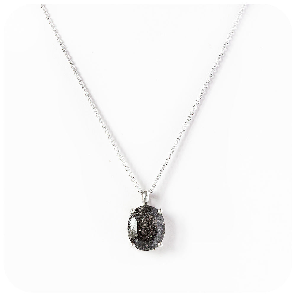 Lana, an Oval cut Black Rutile Quartz Pendant and Chain