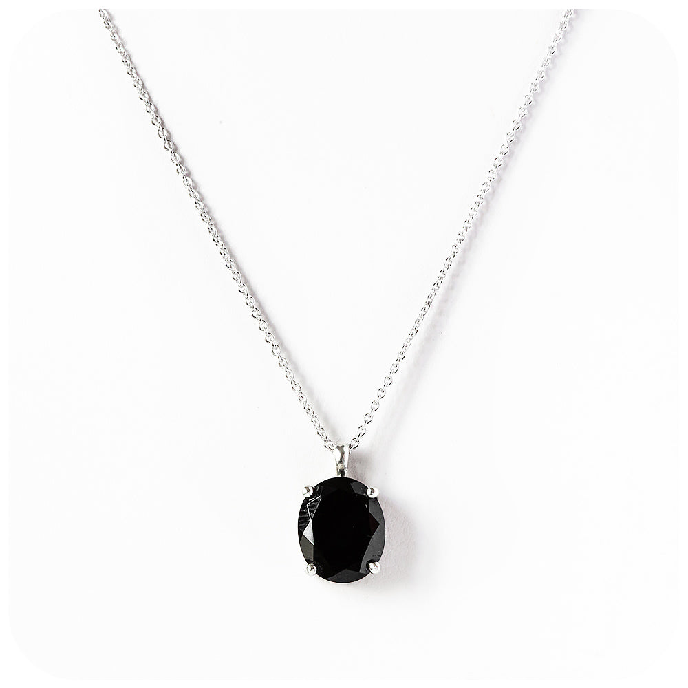 Lana, an Oval cut Black Spinel Pendant and Chain