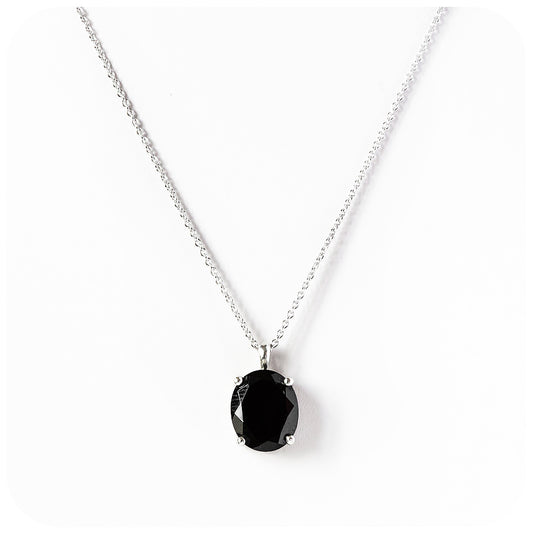 Lana, an Oval cut Black Spinel Pendant and Chain