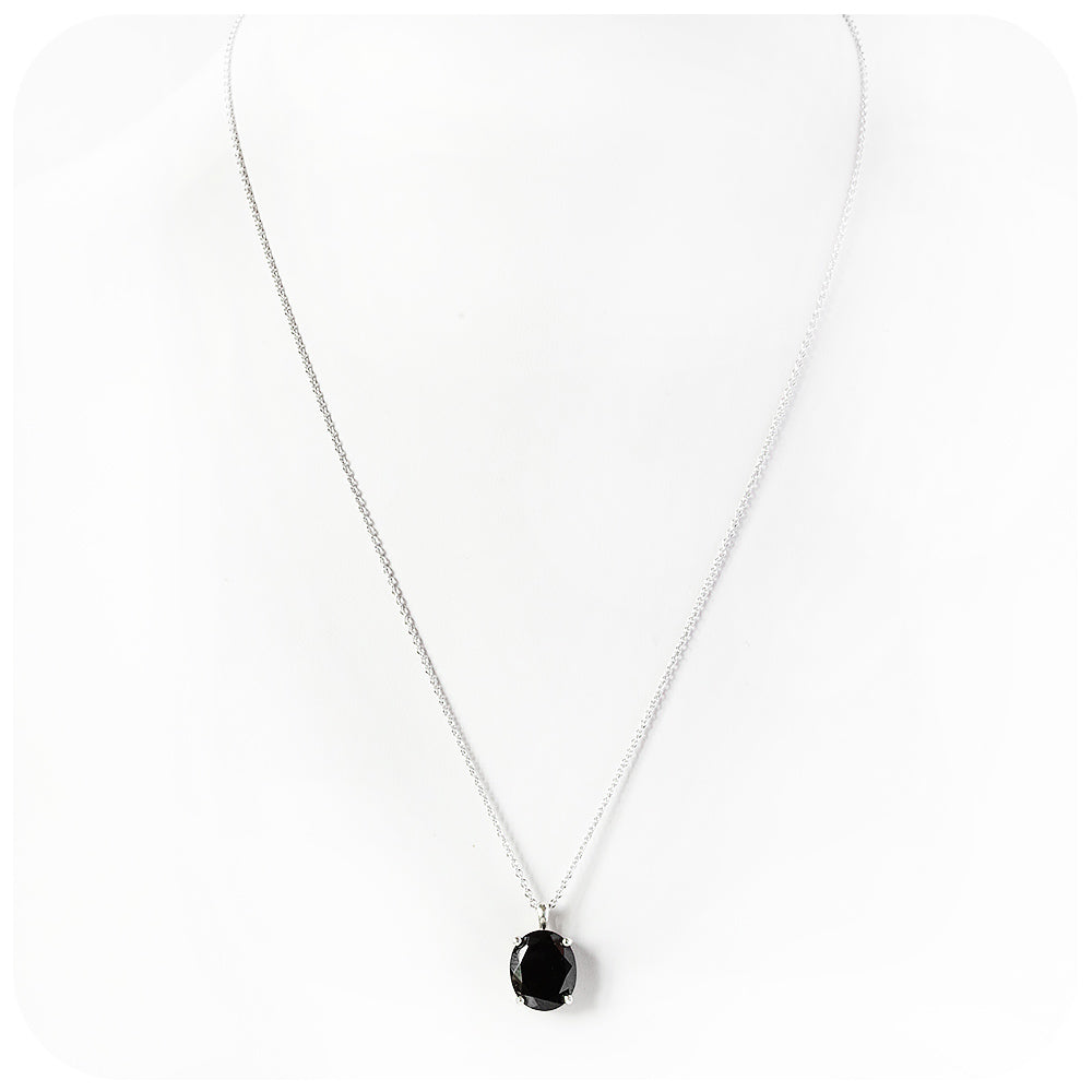 Lana, an Oval cut Black Spinel Pendant and Chain