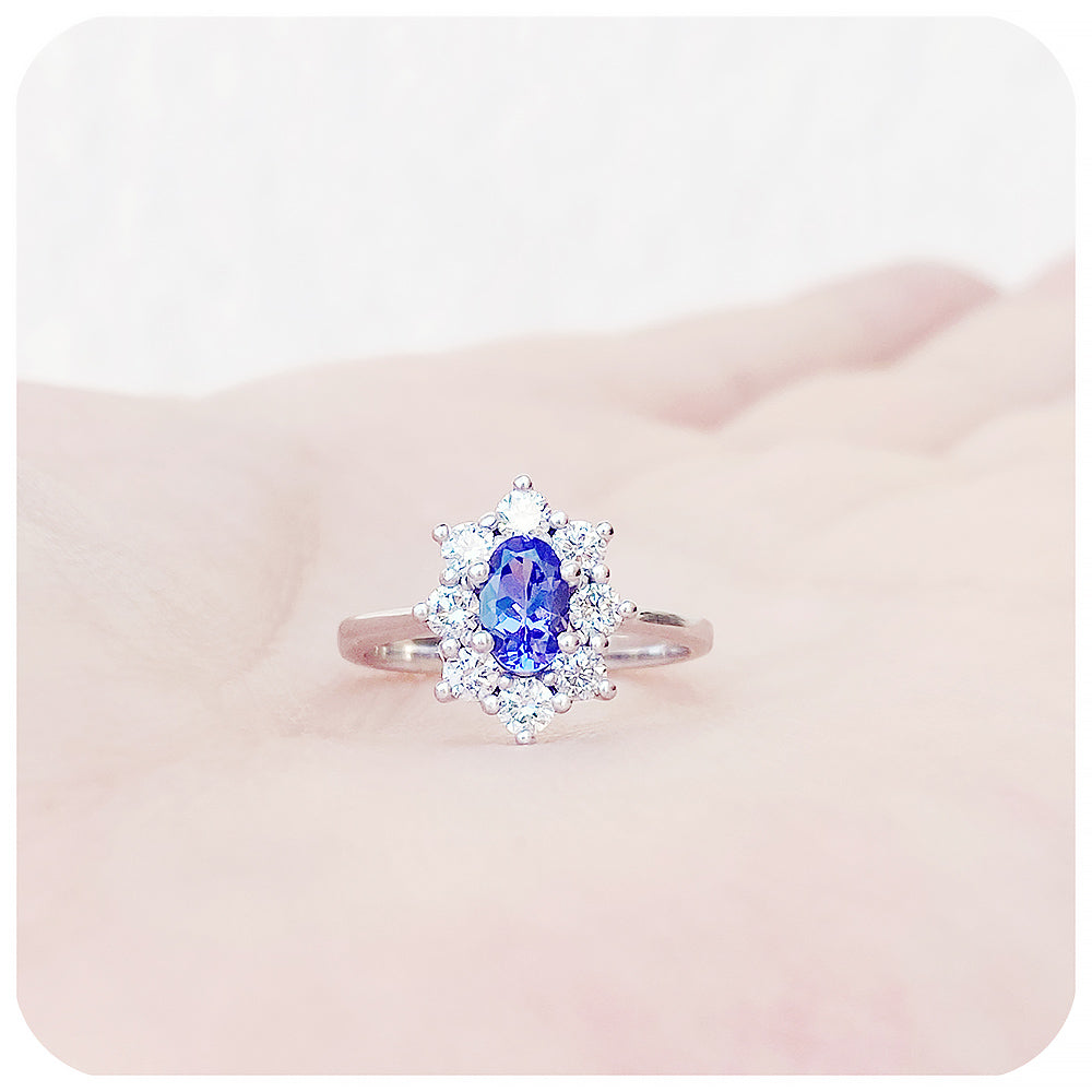 Oval cut Blue Sapphire and Diamond Halo Engagement Ring - Victoria's Jewellery