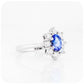 Oval cut Blue Sapphire and Moissanite Halo Engagement Ring - Victoria's Jewellery