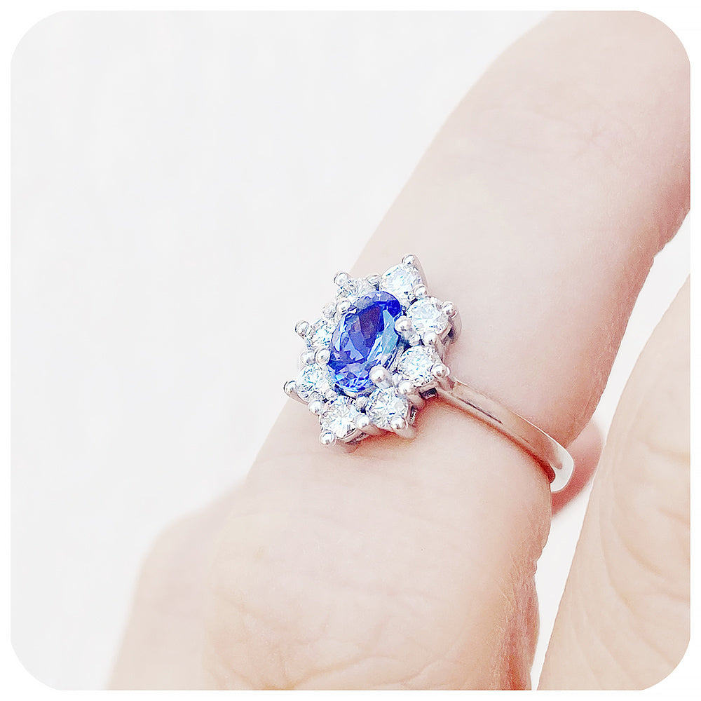 Oval cut Blue Sapphire and Moissanite Halo Engagement Ring - Victoria's Jewellery