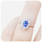 Oval cut Blue Sapphire and Moissanite Halo Engagement Ring - Victoria's Jewellery