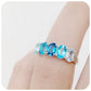 Oval cut Blue Topaz Rainbow Half Eternity Anniversary Ring - Victoria's Jewellery