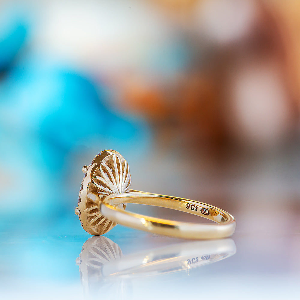 Tilana, an Oval cut Diamond Halo Engagement Ring - 1.5ct