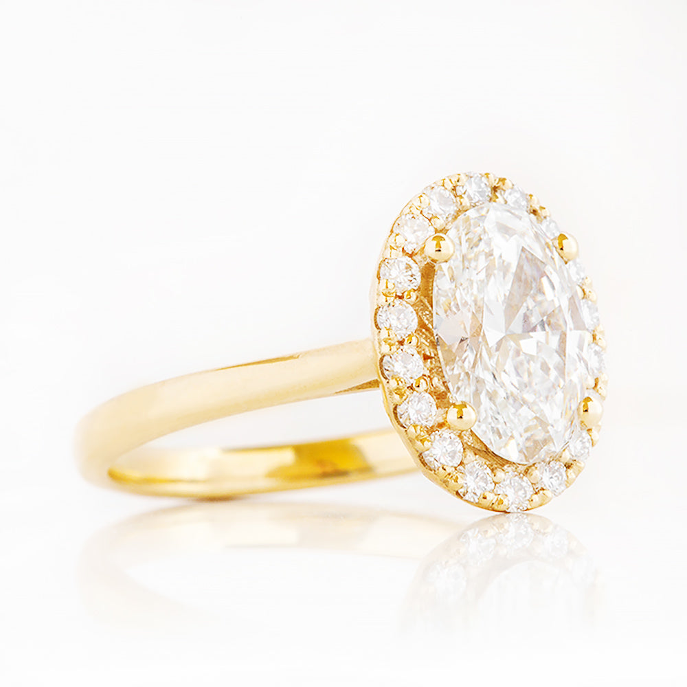 Tilana, an Oval cut Diamond Halo Engagement Ring - 1.5ct