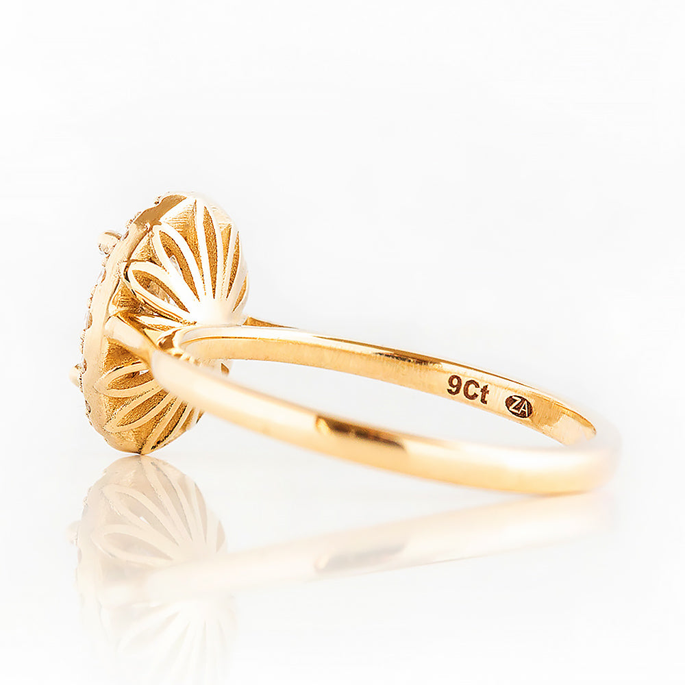 Tilana, an Oval cut Diamond Halo Engagement Ring - Victoria's Jewellery