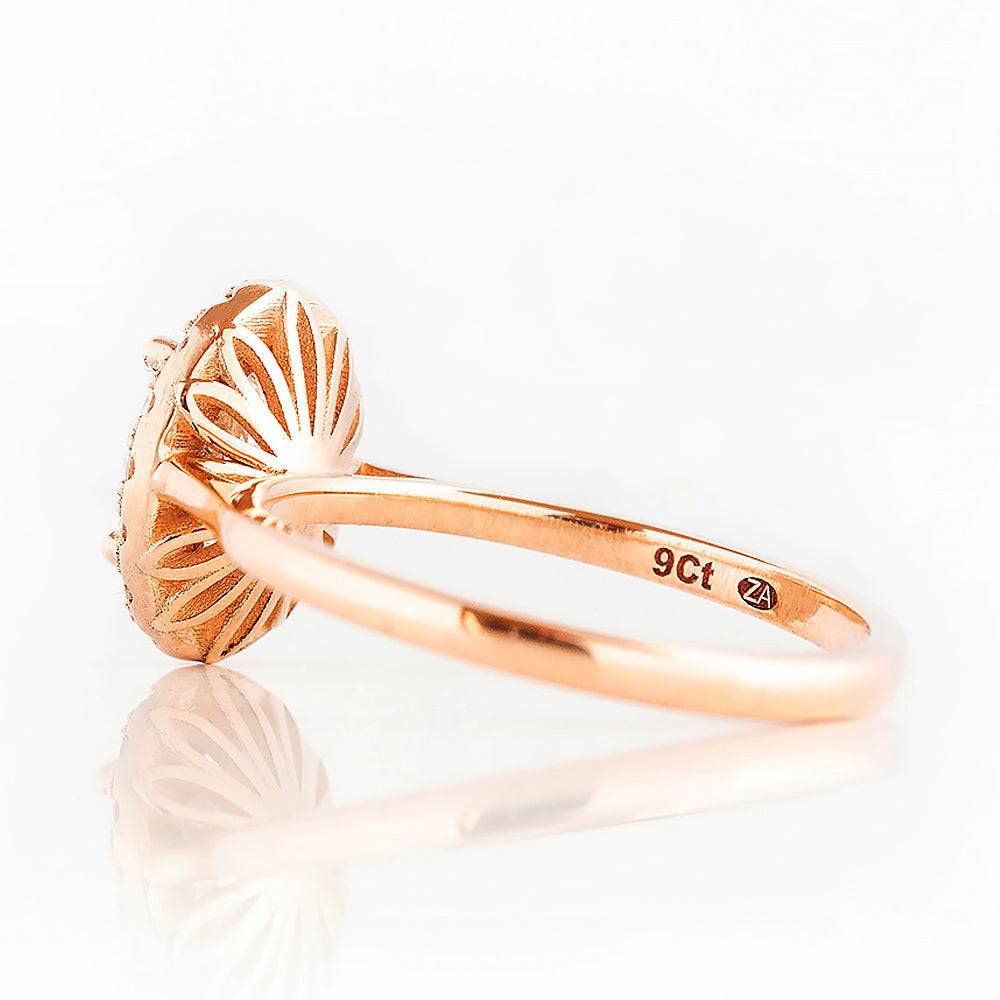 Tilana, an Oval cut Diamond Halo Engagement Ring - Victoria's Jewellery