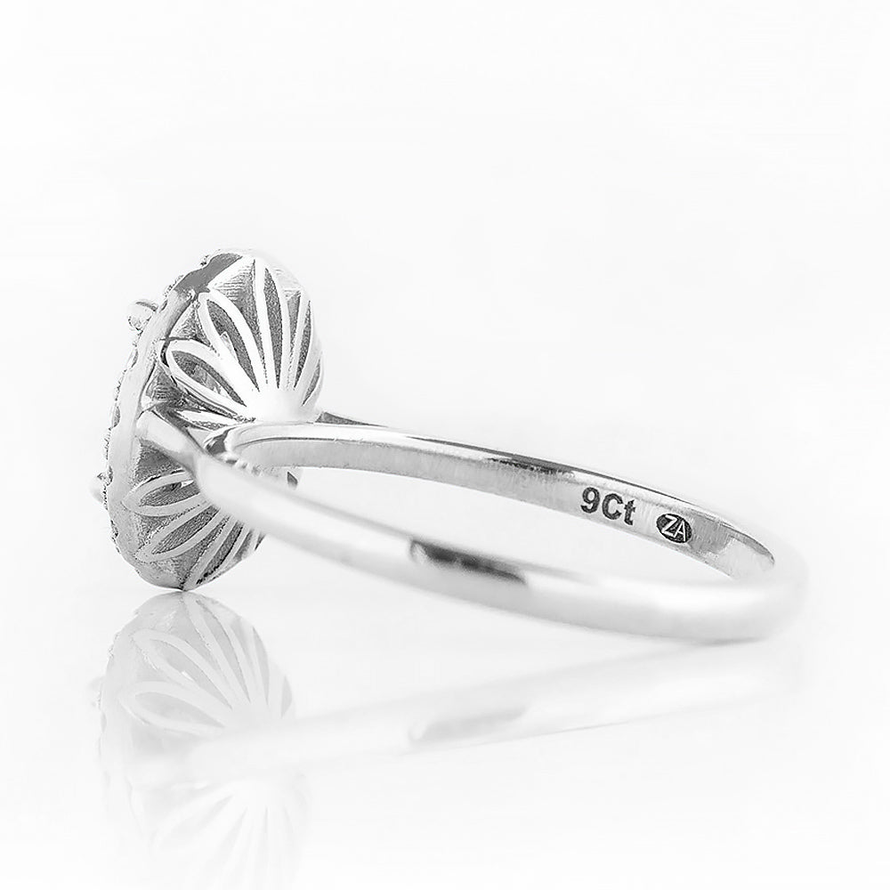 Tilana, an Oval cut Diamond Halo Engagement Ring - Victoria's Jewellery