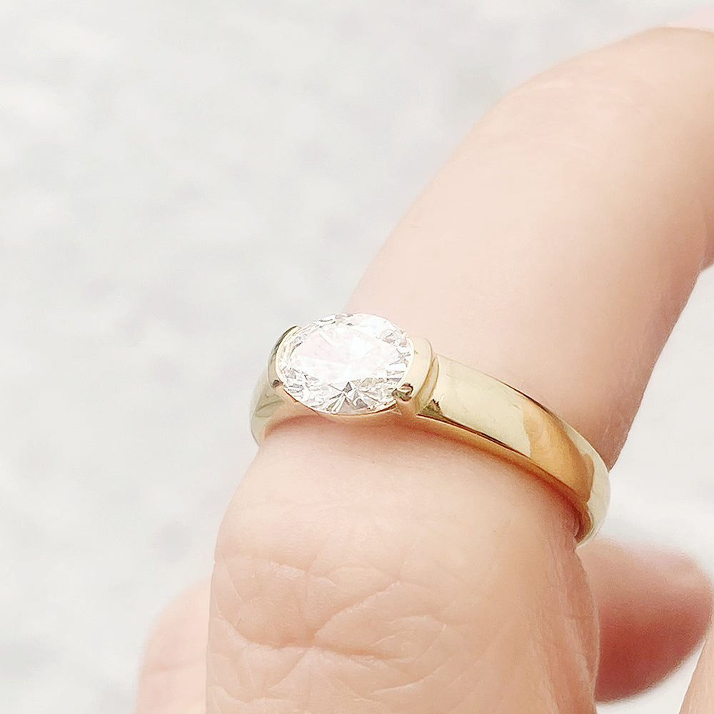 Akari, an oval cut Lab Diamond Ring
