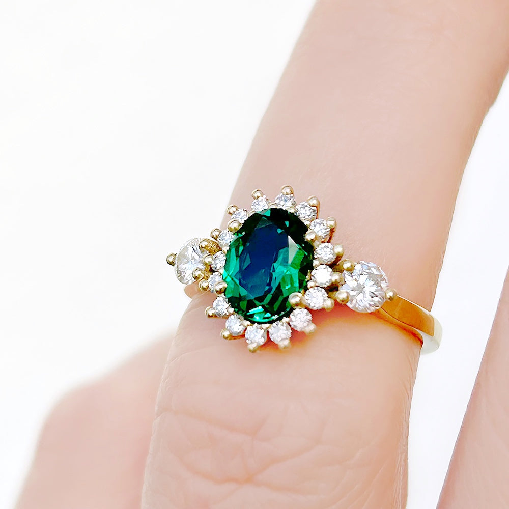 Devlyn, an Emerald and Diamond Ring
