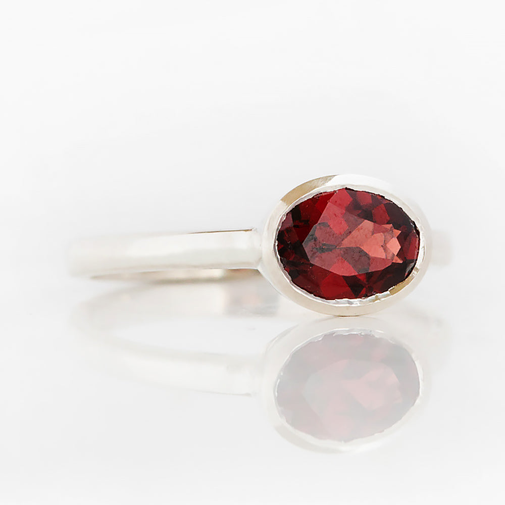 Quinn, an Oval cut Garnet Stack Ring