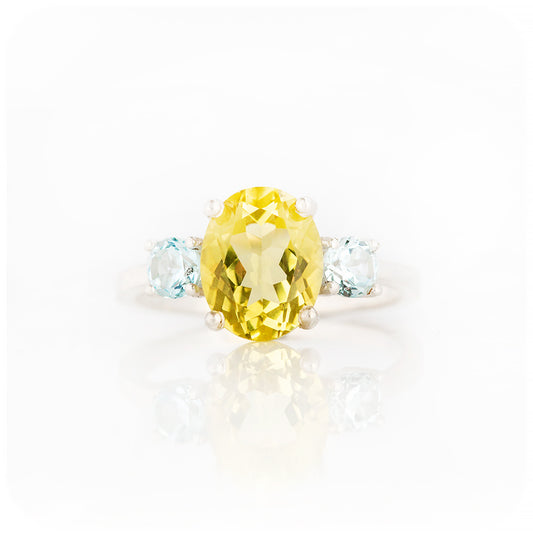 Oval cut Lemon Quartz and Blue Topaz Trilogy Ring - Victoria's Jewellery