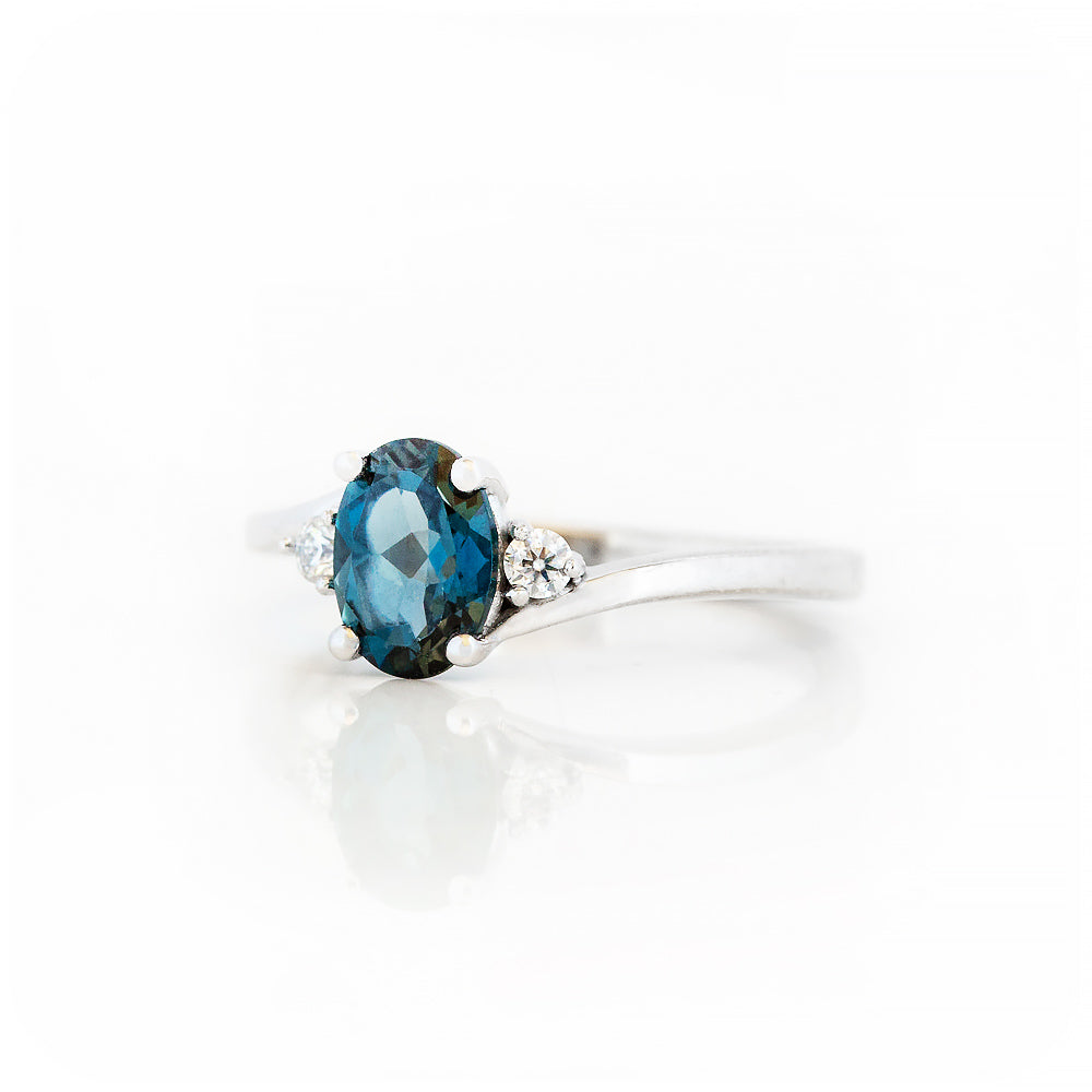 Oval cut London Blue Topaz and Lab Diamond Trilogy Engagement Ring in White Gold - Victoria's Jewellery