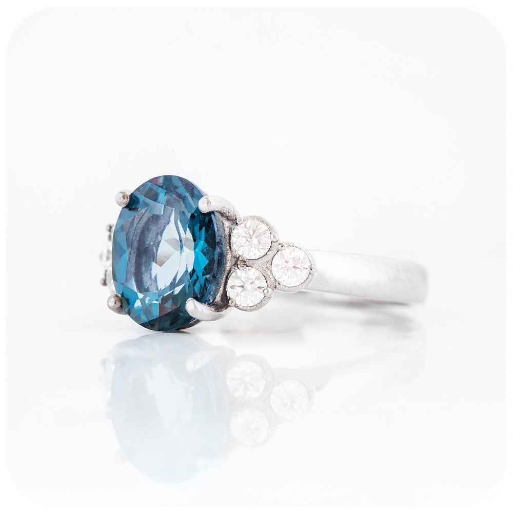 Oval cut London Blue Topaz and Moissanite Cluster Anniversary Ring - Victoria's Jewellery