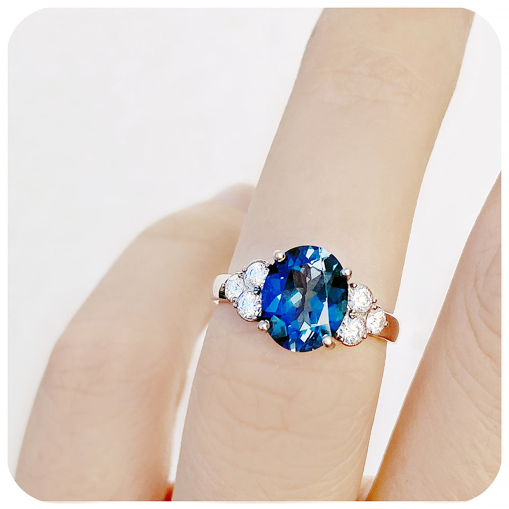 Oval cut London Blue Topaz and Moissanite Cluster Anniversary Ring - Victoria's Jewellery