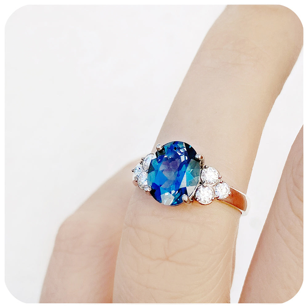 Oval cut London Blue Topaz and Moissanite Cluster Anniversary Ring - Victoria's Jewellery