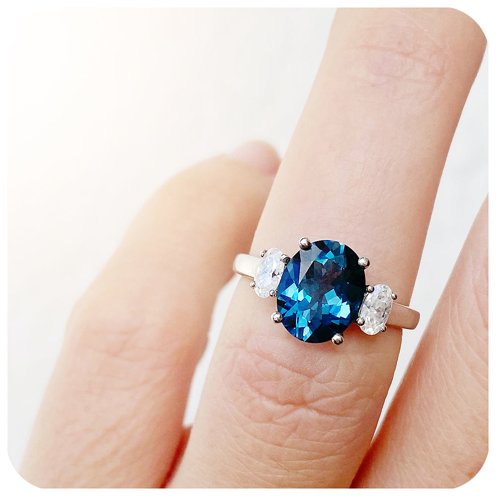 teal london blue topaz and moissanite oval cut trilogy engagement ring - Victoria's Jewellery