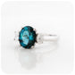 teal london blue topaz and moissanite oval cut trilogy engagement ring - Victoria's Jewellery