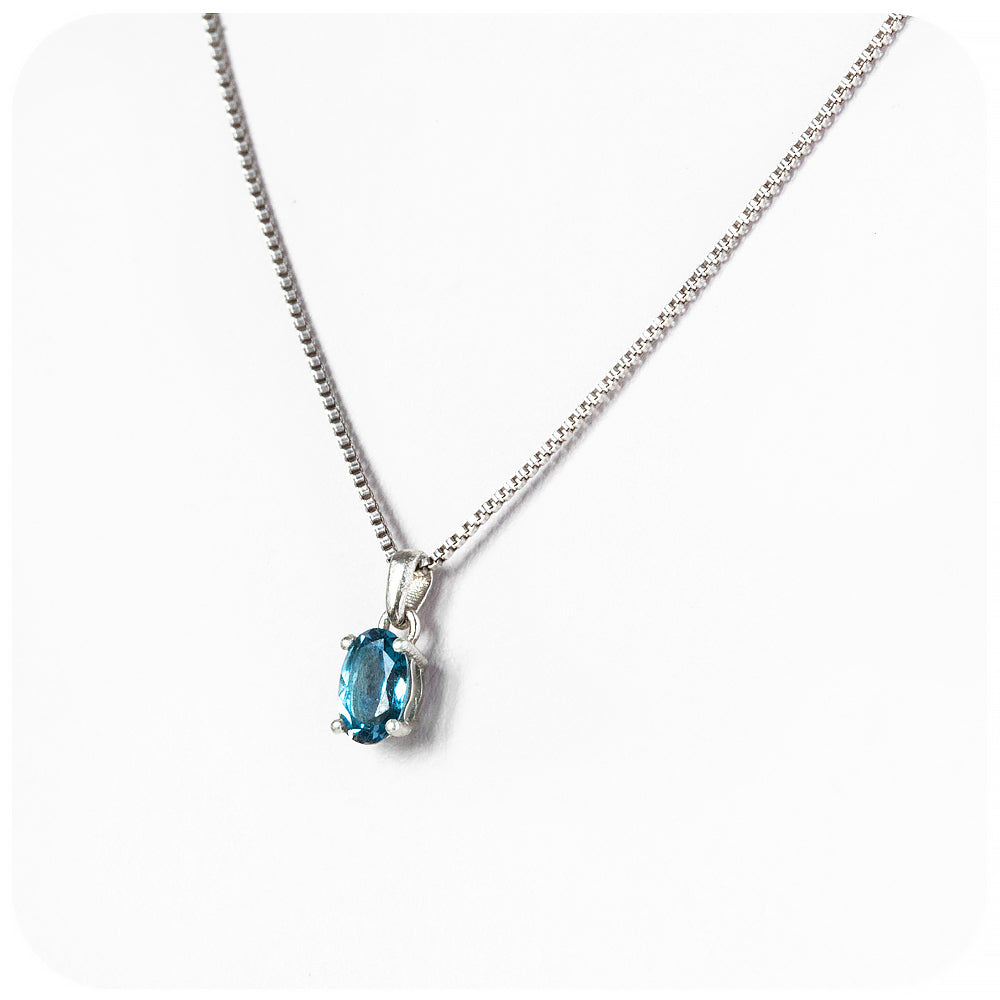 oval cut teal london blue topaz, november birthstone pendant and chain