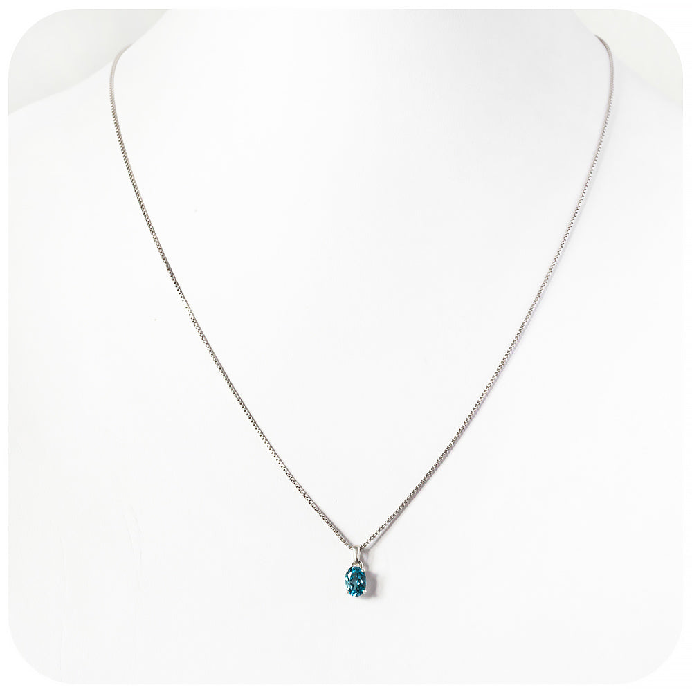 oval cut teal london blue topaz, november birthstone pendant and chain