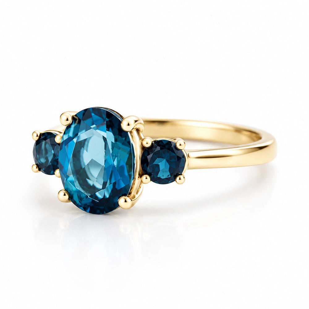 Hallie, London Blue Topaz Oval Trilogy Ring - Victoria's Jewellery