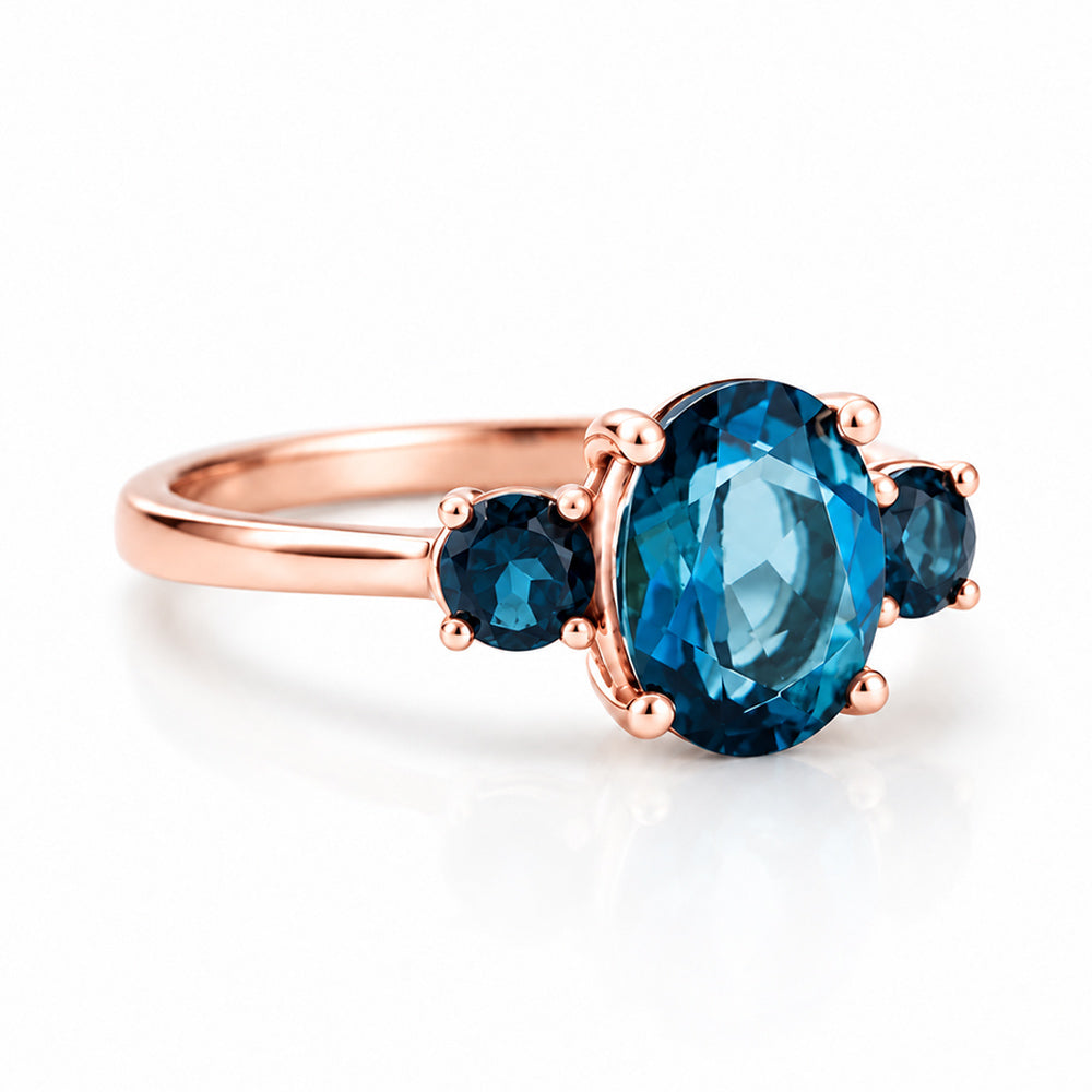 Hallie, London Blue Topaz Oval Trilogy Ring - Victoria's Jewellery
