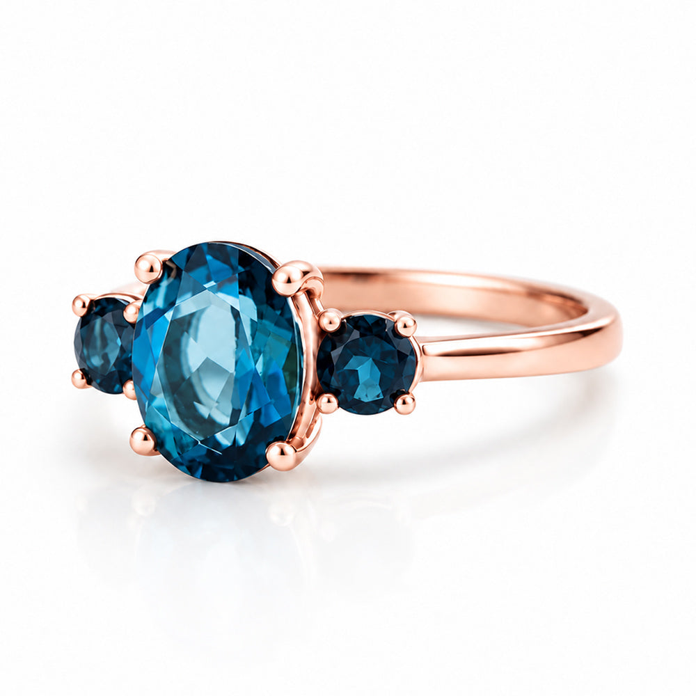 Hallie, London Blue Topaz Oval Trilogy Ring - Victoria's Jewellery