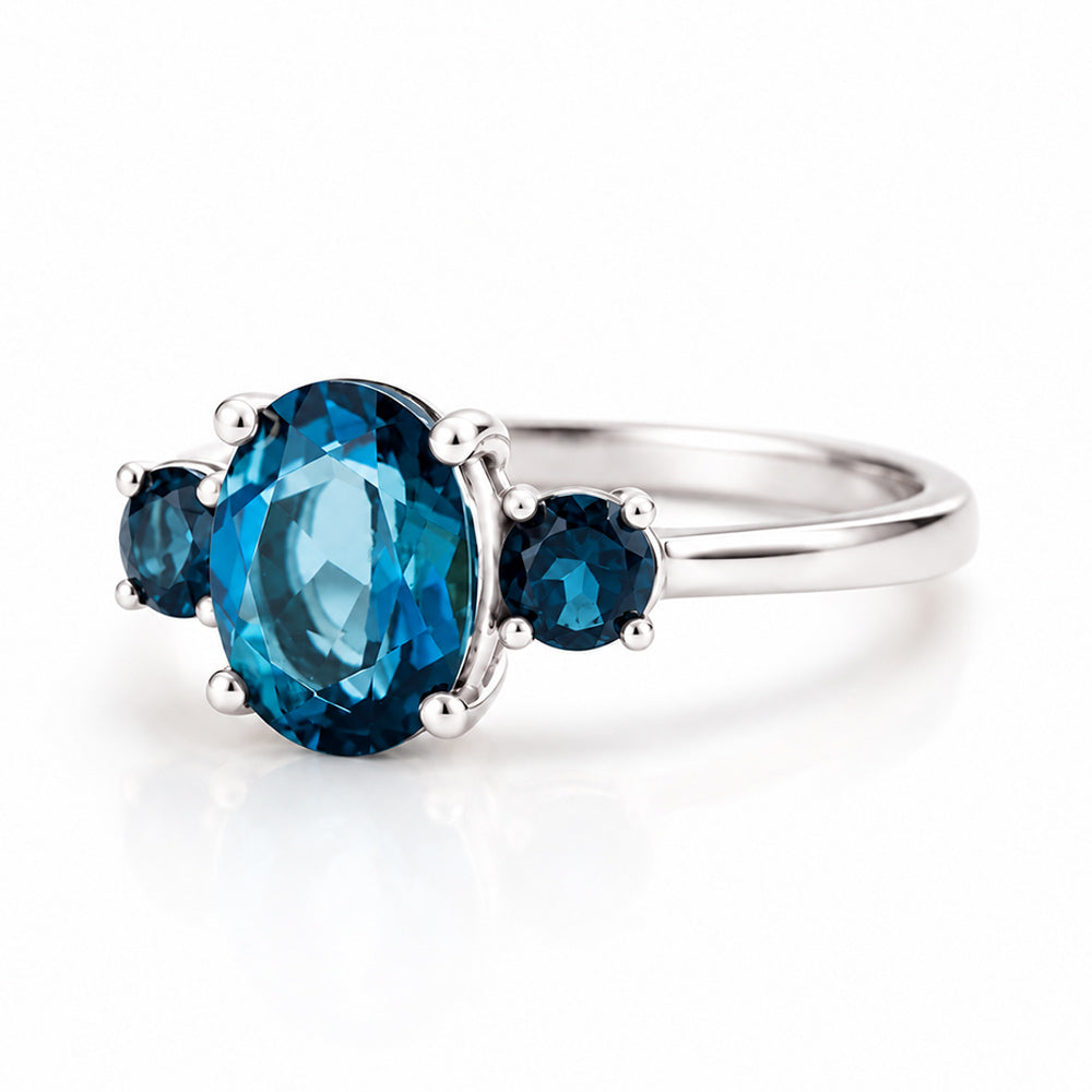 Hallie, London Blue Topaz Oval Trilogy Ring - Victoria's Jewellery